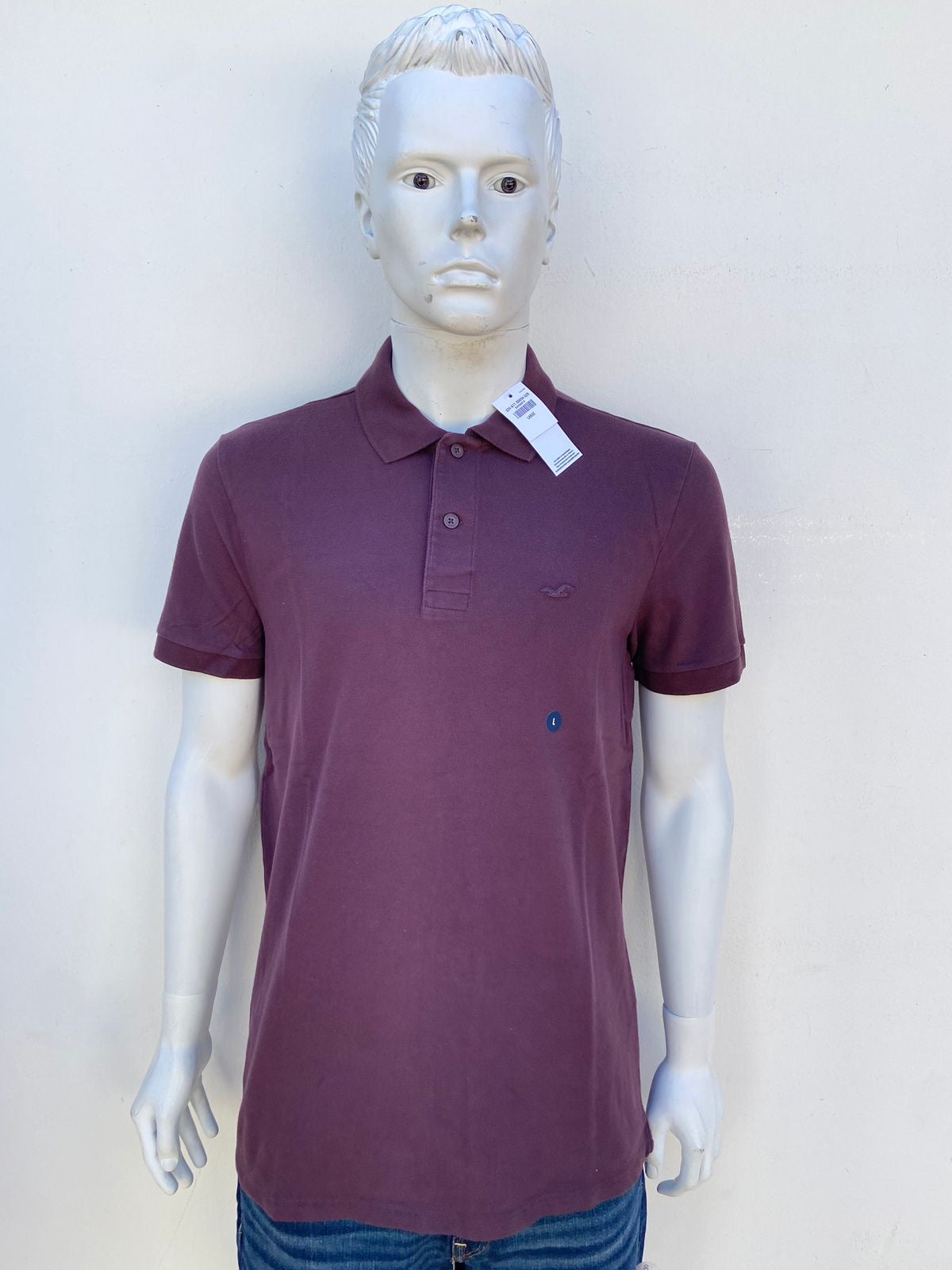 Polocher Hollister original marrón con logotipo de la marca al