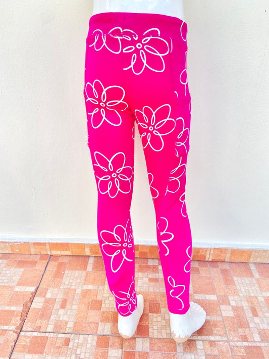 Legging Carter’s original rosada con estampado de flores en color blanco.