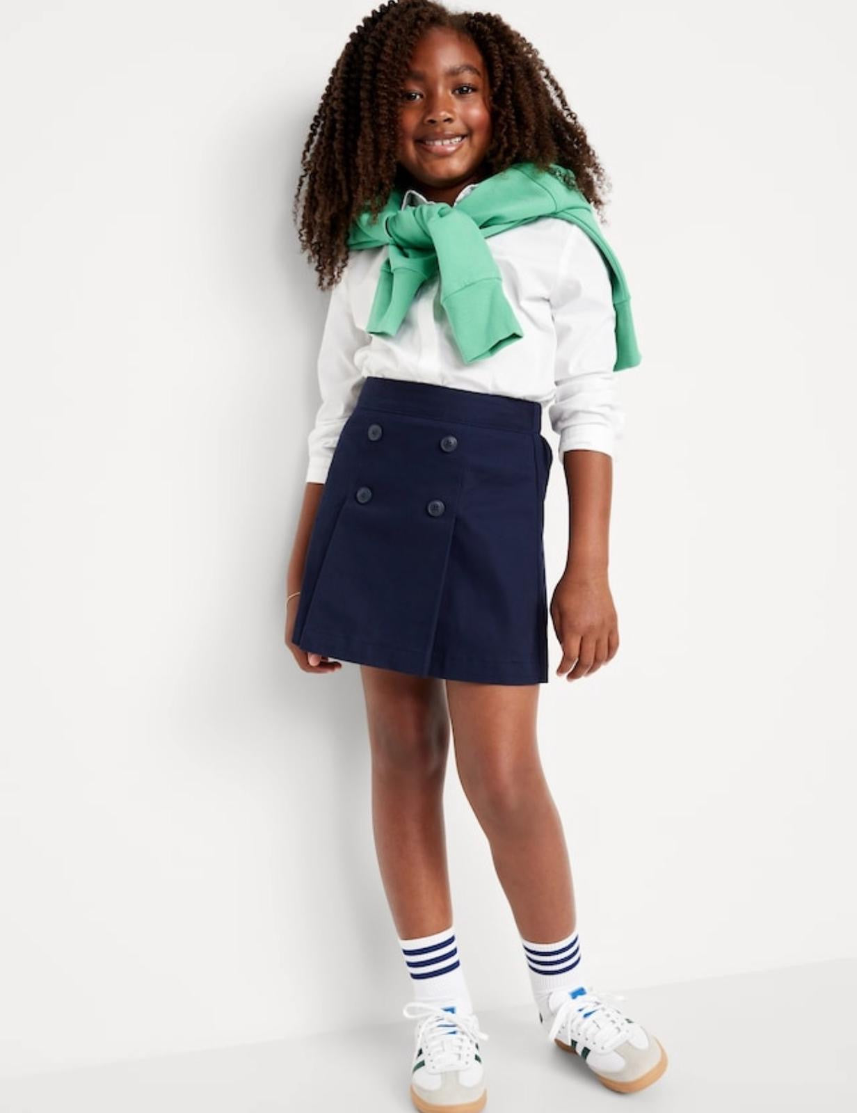 Falda OLD NAVY Original, en color azul marino con 4 botones al frente.