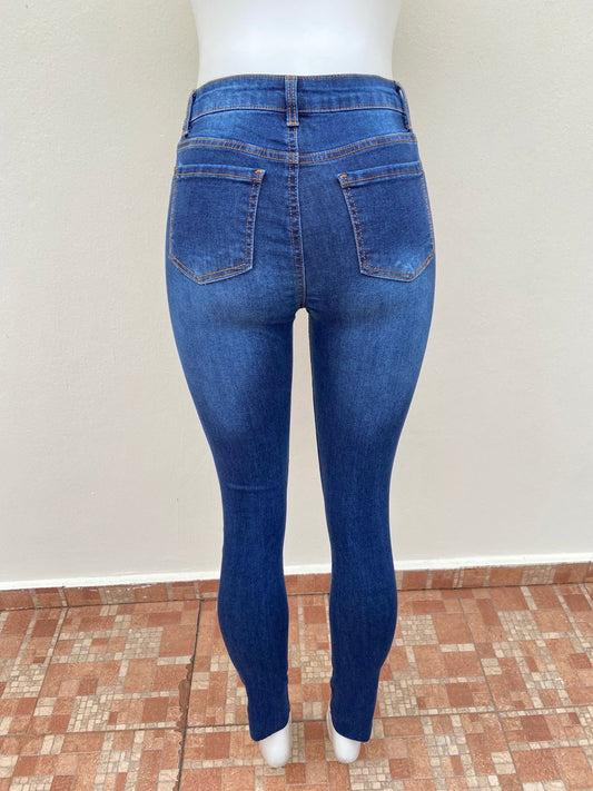 Pantalón Jean PRO STAR original, azul oscuro, con pequeño rasgados en las rodillas.