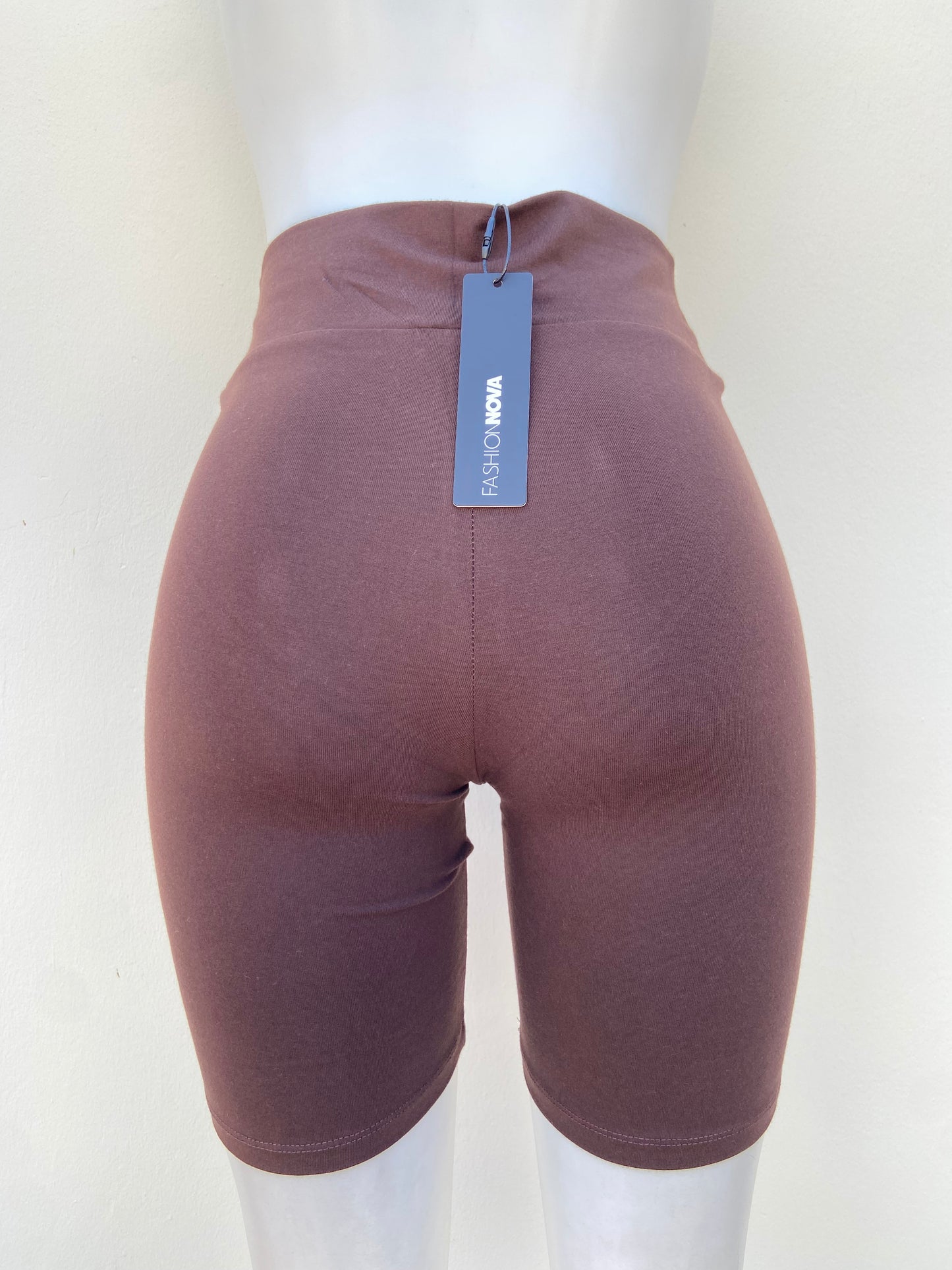 Legging marron/chocolate lisa con pretina alta.