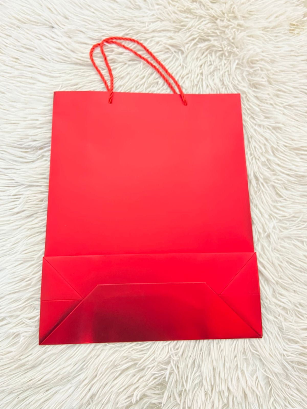 Shopping en color rojo estampado de lineas de cuadros. MEDIANO