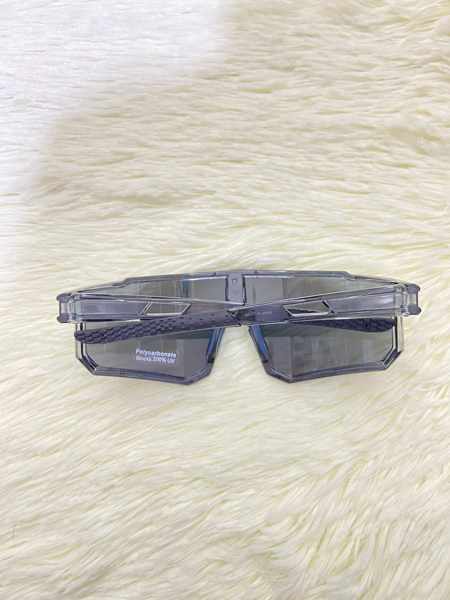 Lentes, gris con micas que cambian de color a dorado cromados, 100 % Polycarbonate más protección UV.