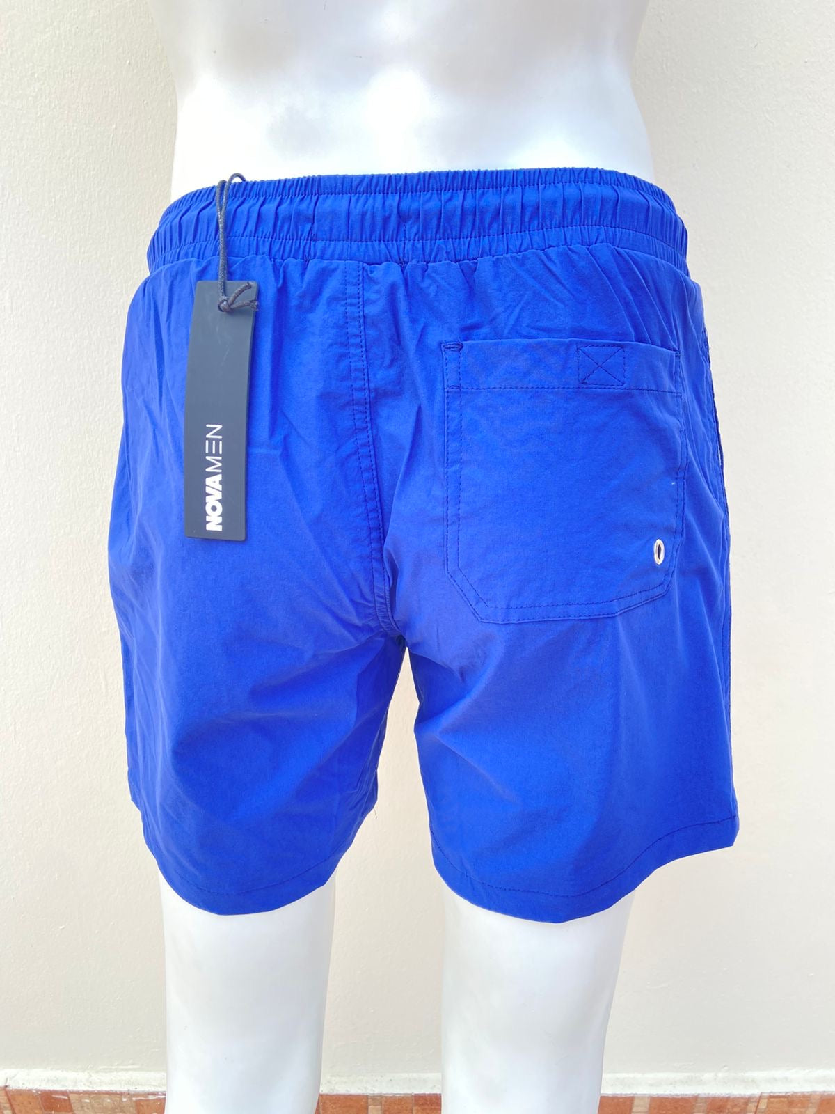 Bañador Baggy azul marino liso con bolsillos