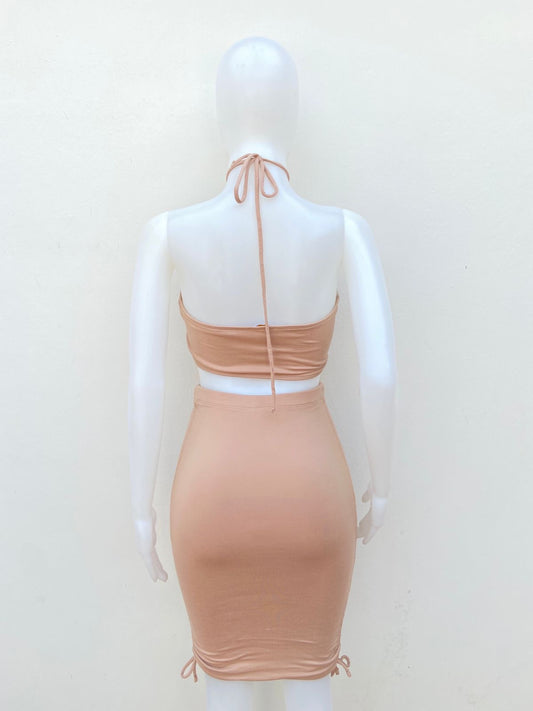 Conjunto Story on original, crema de dos piezas lisas con elástico en los lados.