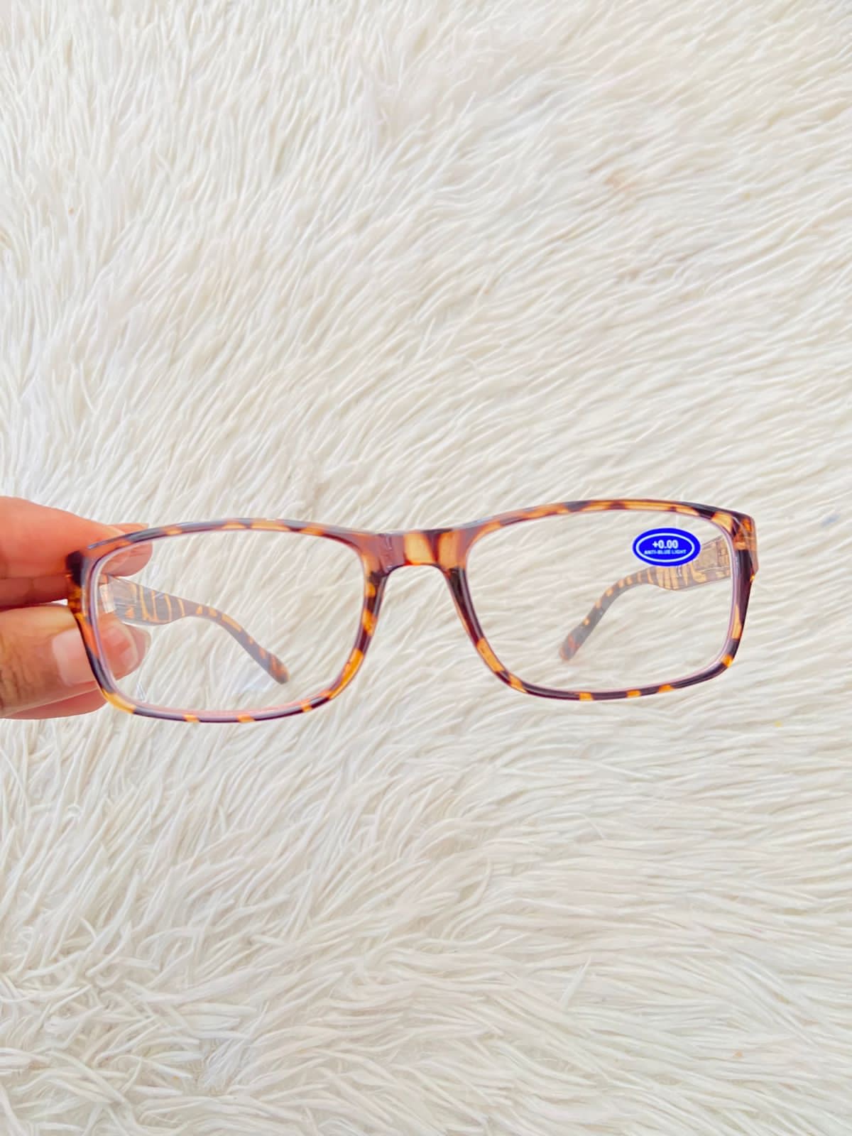 Lentes en color marron claro y estampado de animal print, micas claras. pequeño