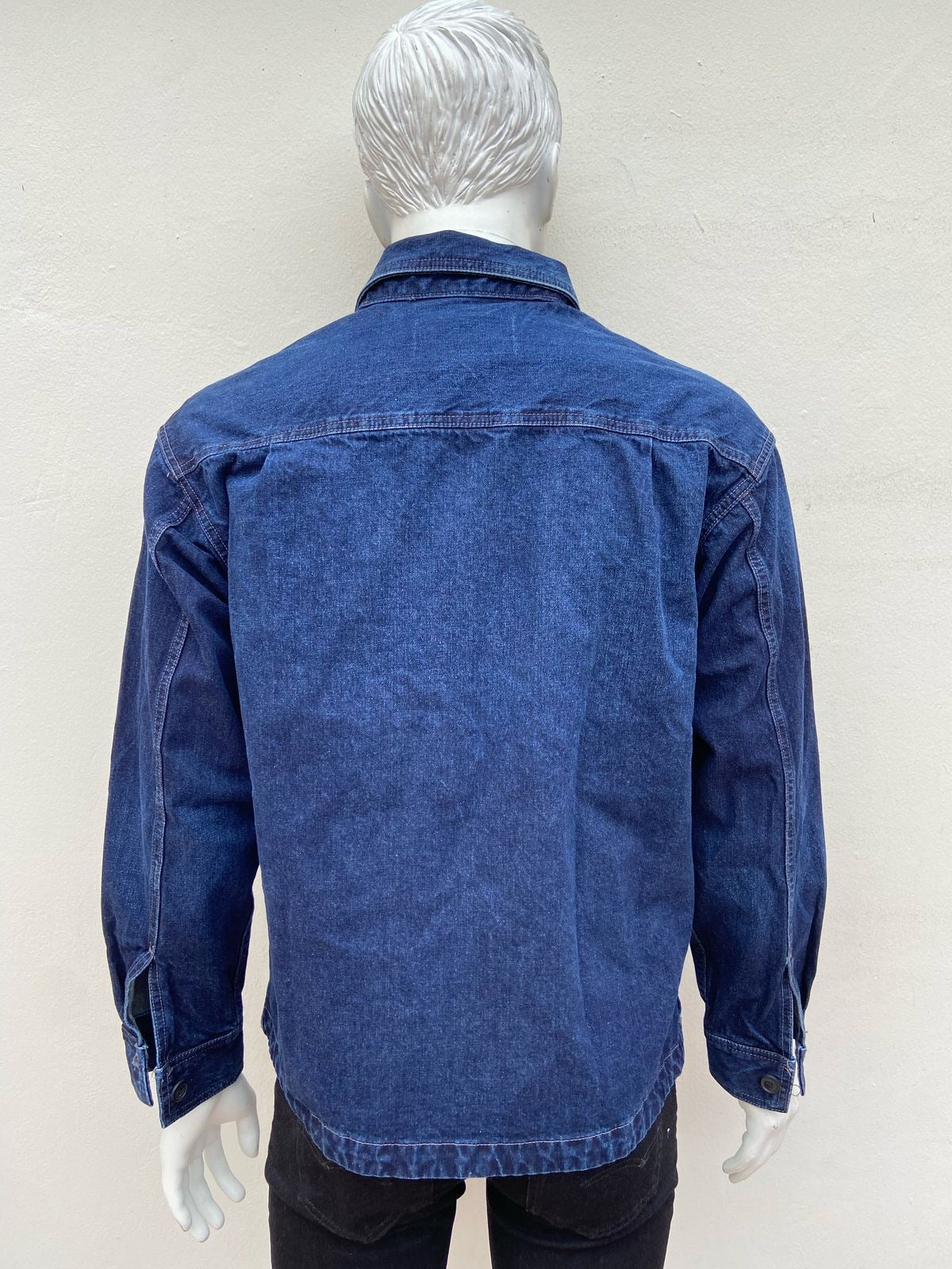 Chaqueta Jean American Eagle original azul marino con bolsillos.