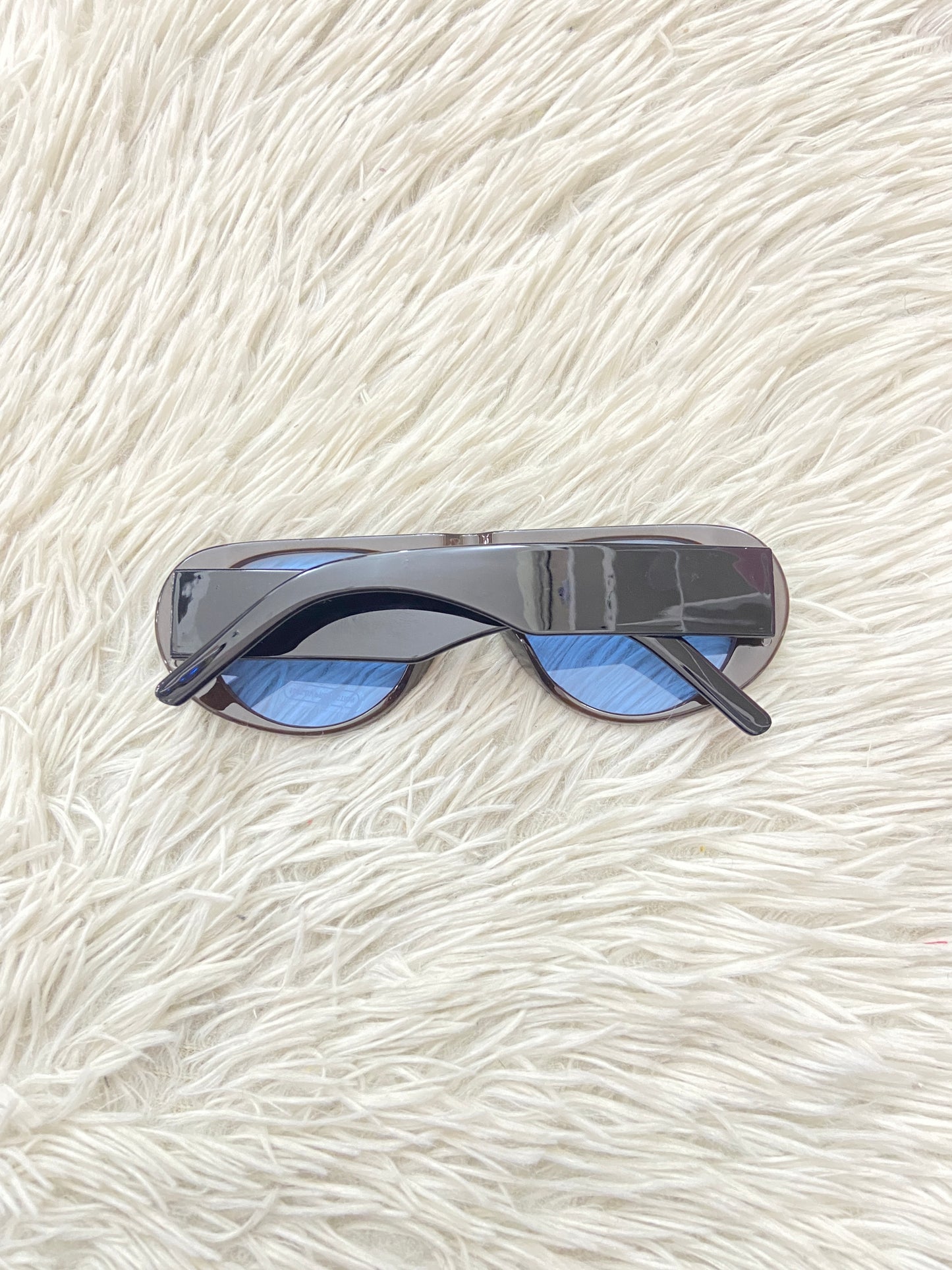 Lentes, negro con micas azules transparente.