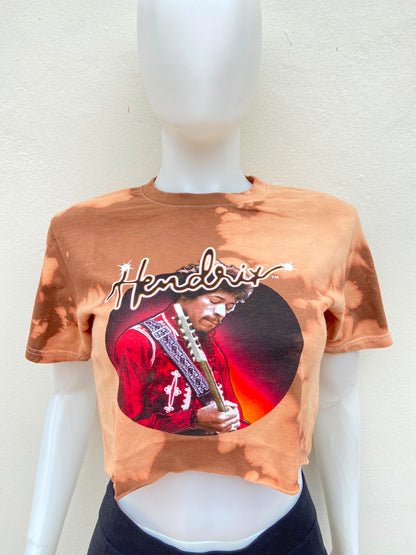 Crop-top marrón con efecto lavado desgastado en tonos beige con estampado de Jimi Hendrix.