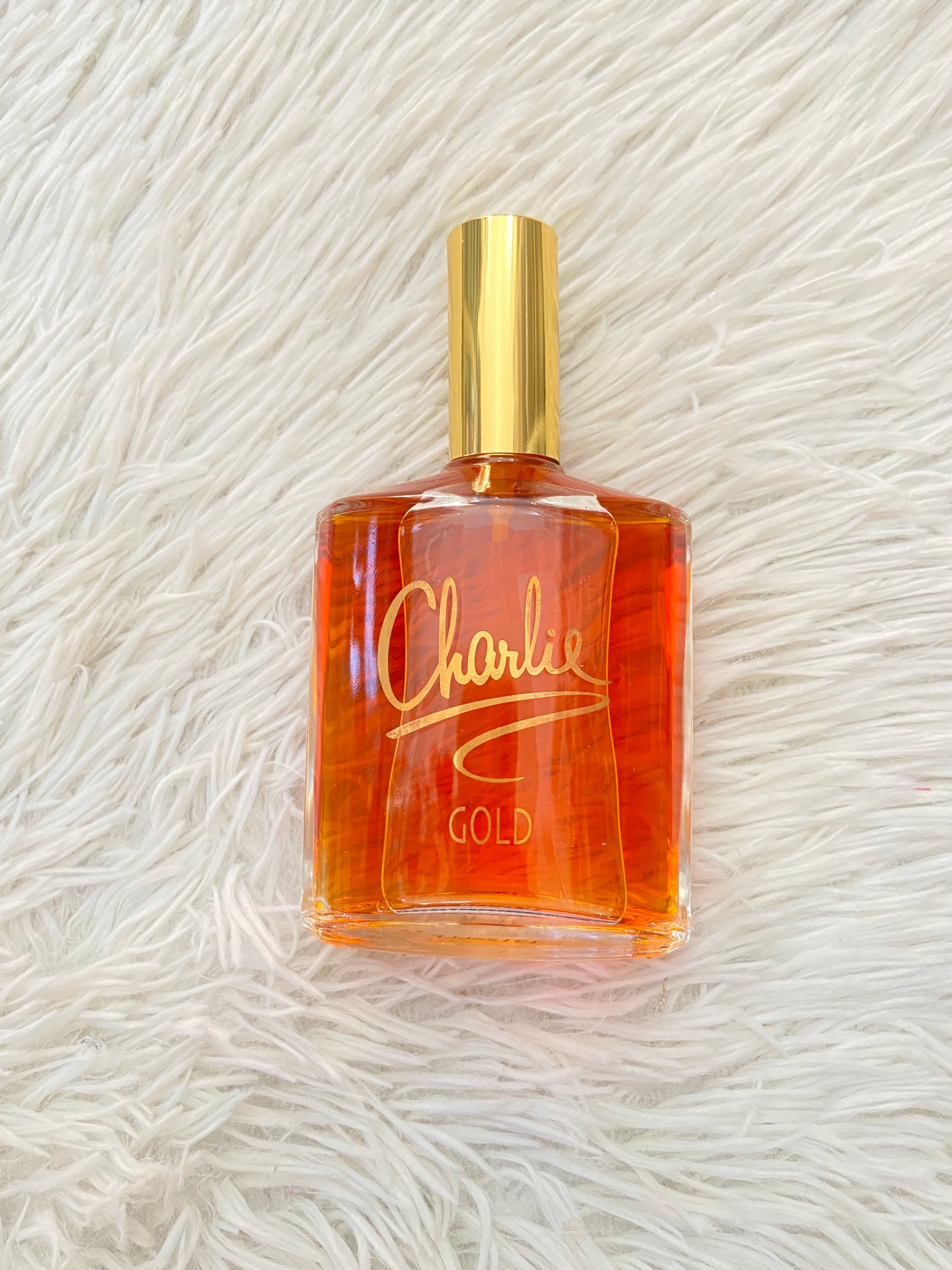 Perfume REVLON CHARLIE GOLD original naranja con detalles dorados. – Qlindo  Store