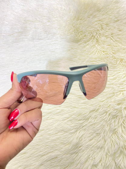 Lentes, verde sage con micas eñ color naranja transparente con protección UV  100%.