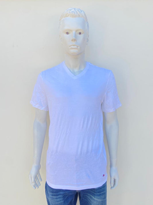 T-shirt Tommy Hilfiger Original en color blanco con cuello V y logotipo de la marca abajo.