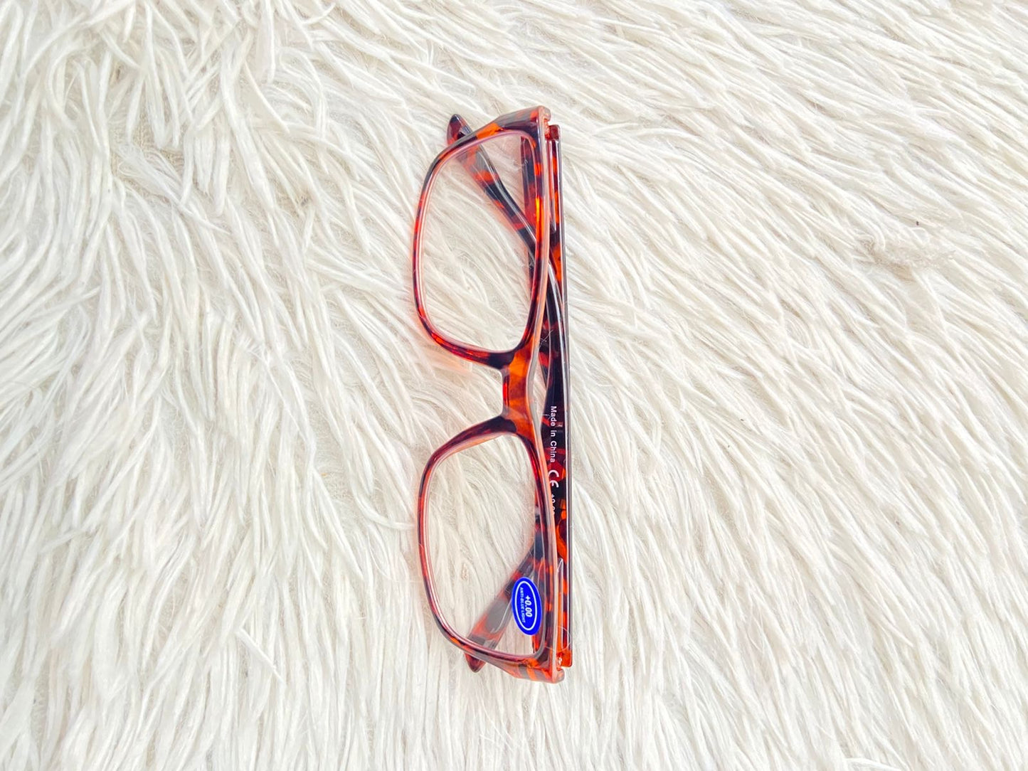 Lentes en color marron y estampado de animal print, micas claras. pequeño