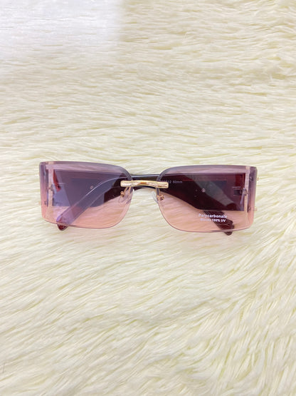 Lentes, morado oscuro con montura marron y detalles dorado,cuadrados pequeños,100 % Polycarbonate y protección UV.