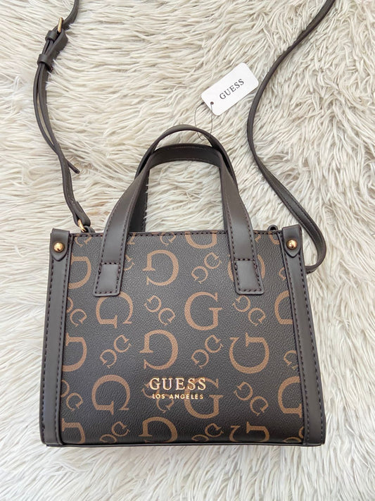 Cartera GUESS original Cartera GUESS – Estilo Iconic Mini Tote ✨

✔ Diseño con el clásico logo G en tono dorado
✔ Correa ajustable + asas dobles par