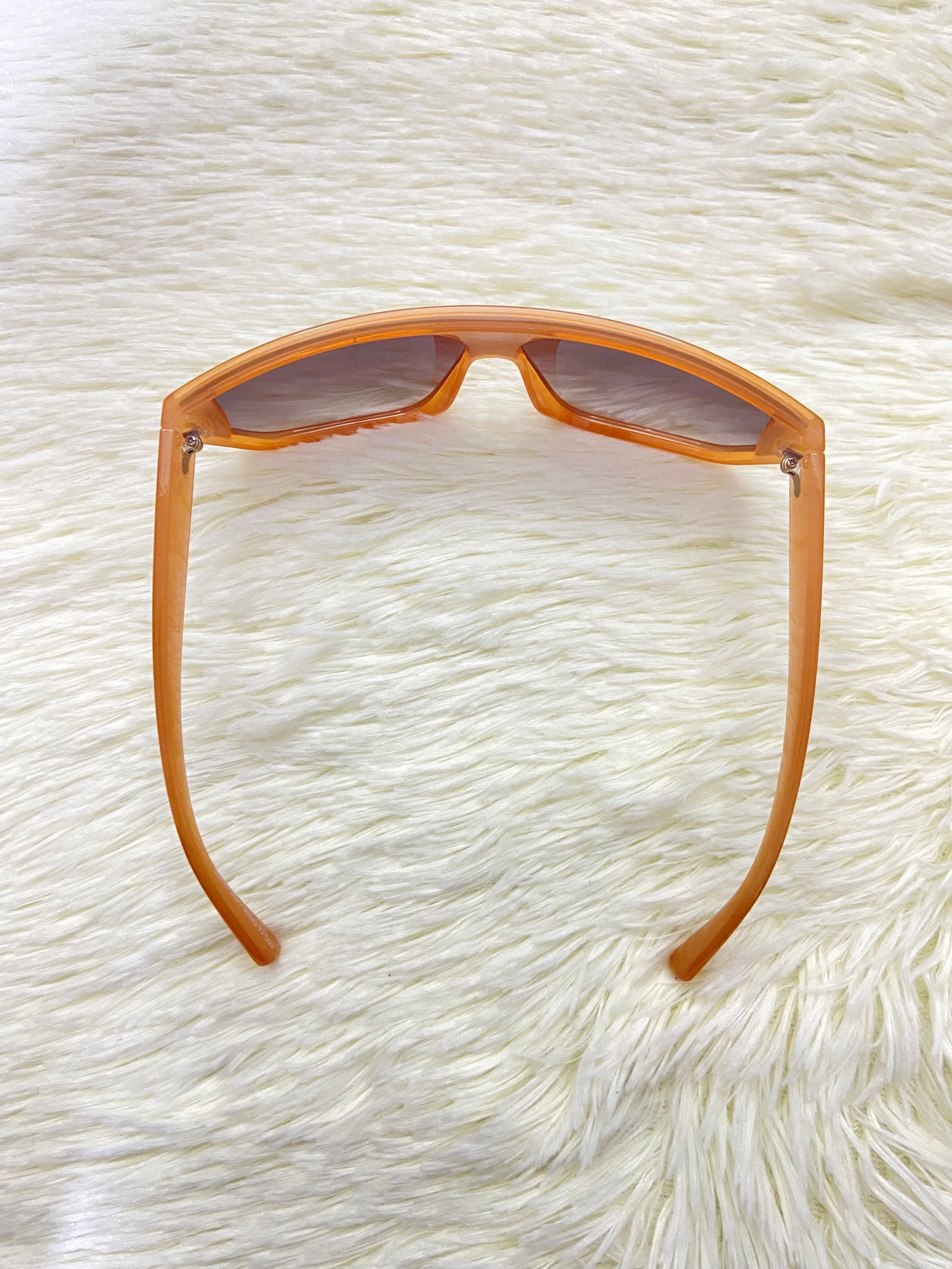 Lentes, naranja oscuro con micas eñ color negro claro, 100 % Polycarbonate y protección UV.