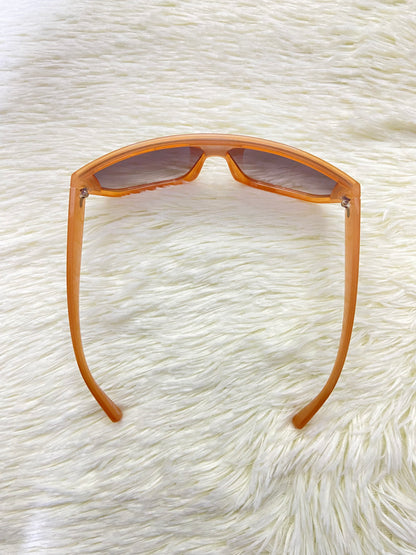 Lentes, naranja oscuro con micas eñ color negro claro, 100 % Polycarbonate y protección UV.