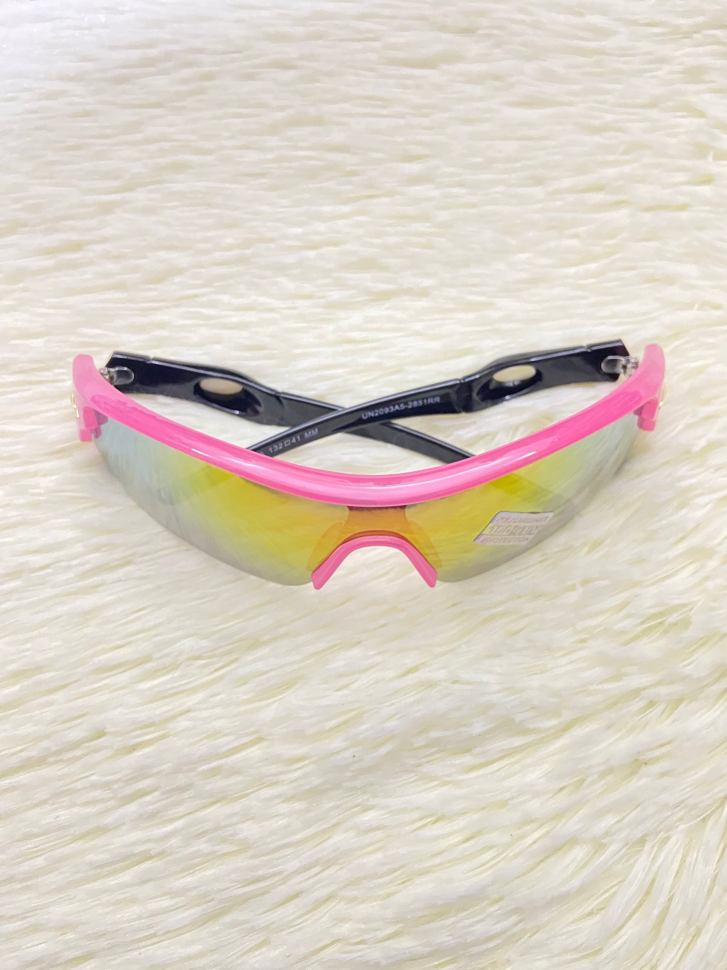 Lentes, rosados con negros y micas que cambian de color, con 100 % Polycarbonate y protección UV.