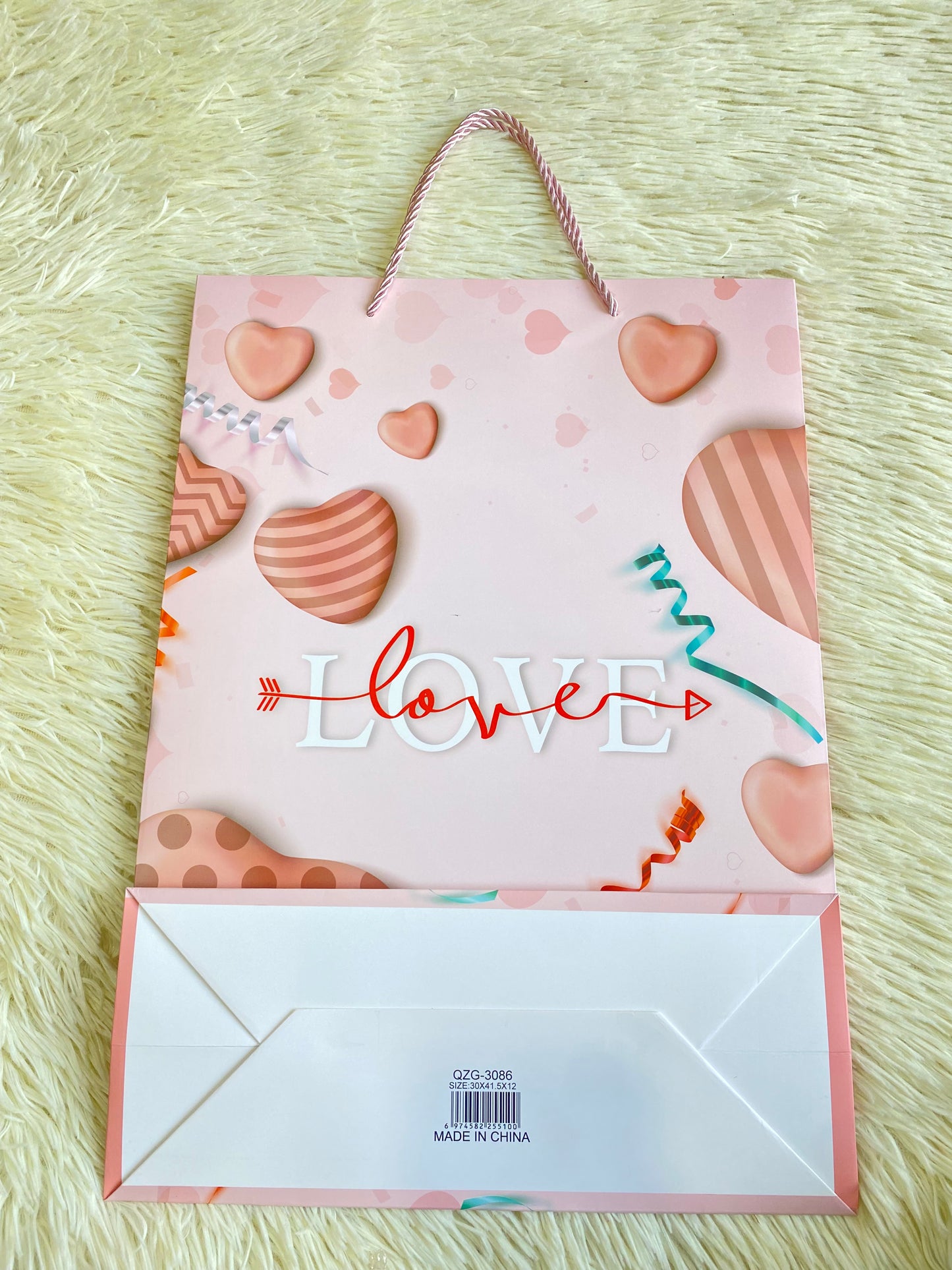 Shopping rosado claro, con corazones y letra LOVE en el centro. GRANDE