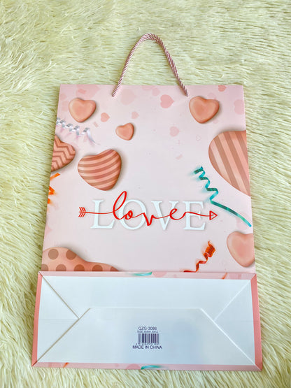 Shopping rosado claro, con corazones y letra LOVE en el centro. GRANDE
