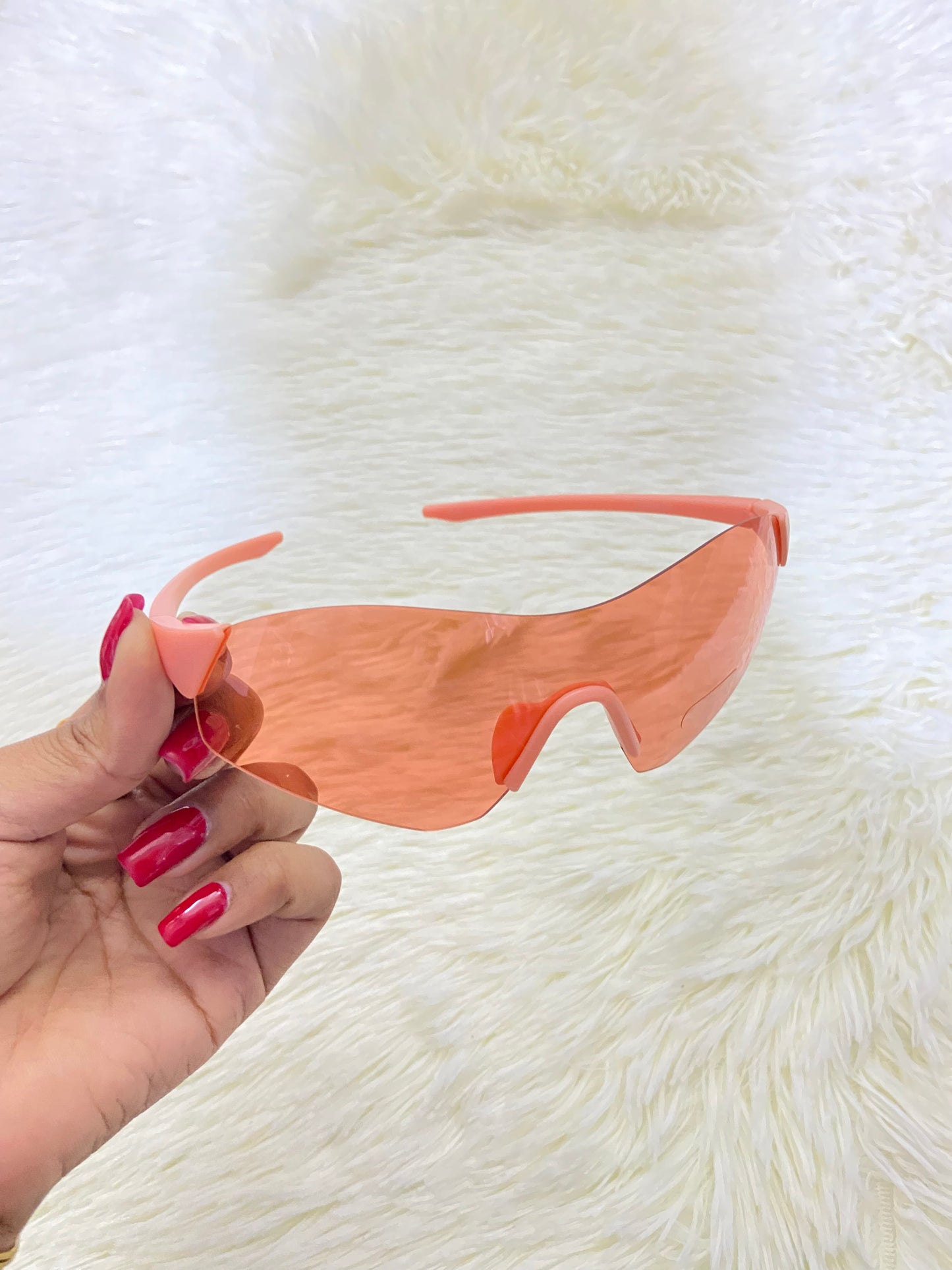 Lentes, naranja con montura color naranja pastel, protección UV  100 %.