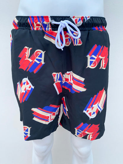 Bañador/Baggy negra con diseño LA en color rojo y azul.