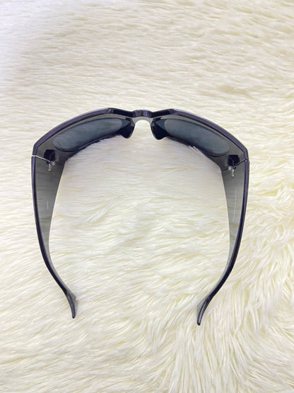 Lentes, negros liso con montura ancha.