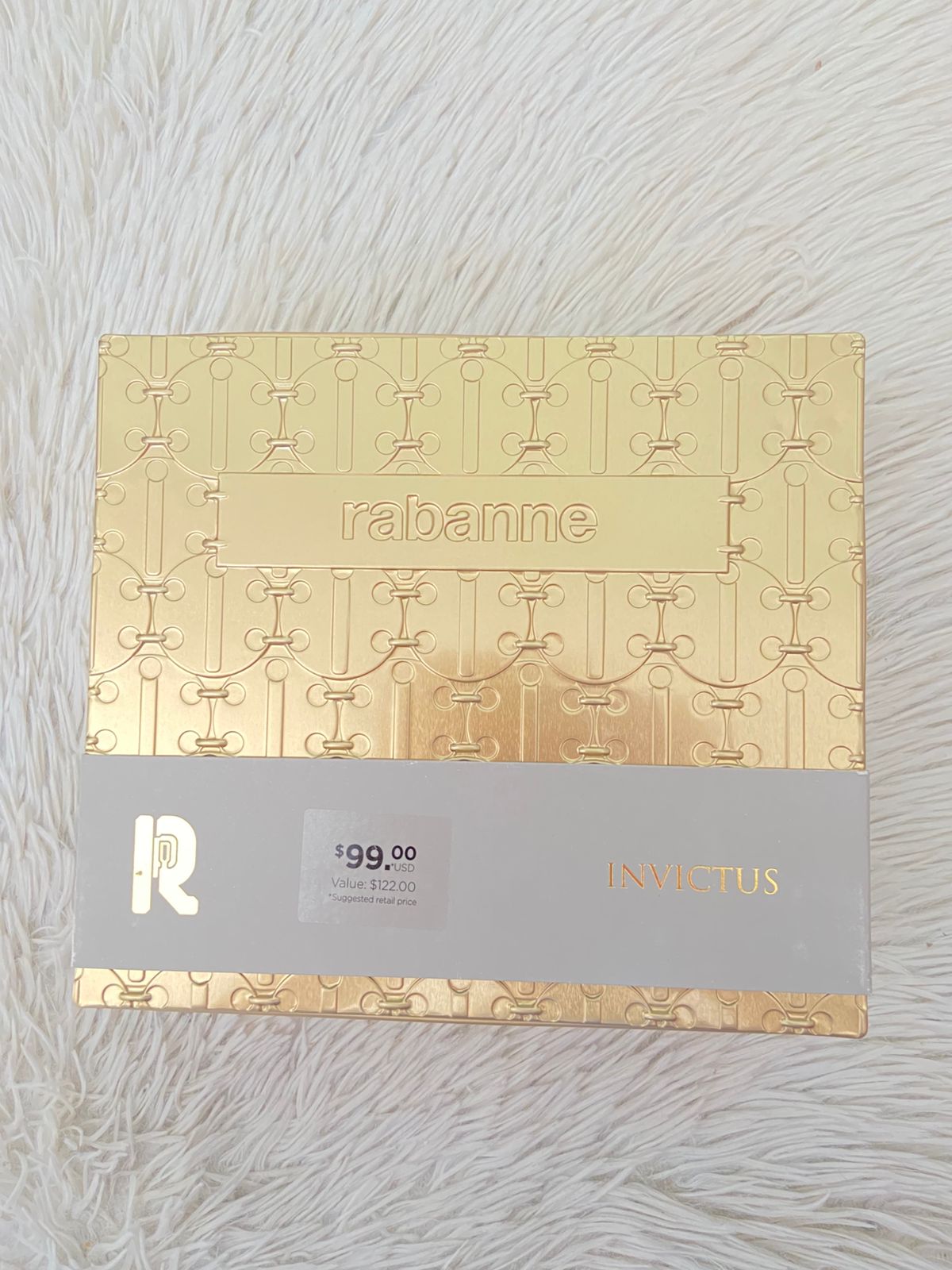 Set de dos INVICTUS Paco Rabanne Original perfume y mini perfume en color plateado.