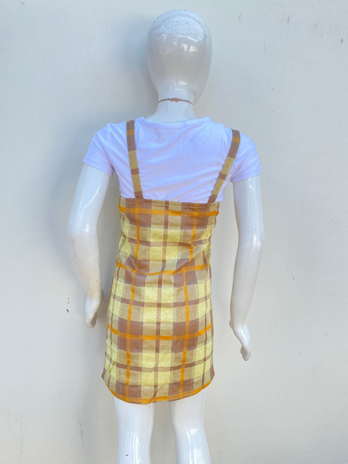 Conjunto/vestido No Comment GIRLS original, anaranjado de cuadros con blusa blanca y oso pequeño en el centro.