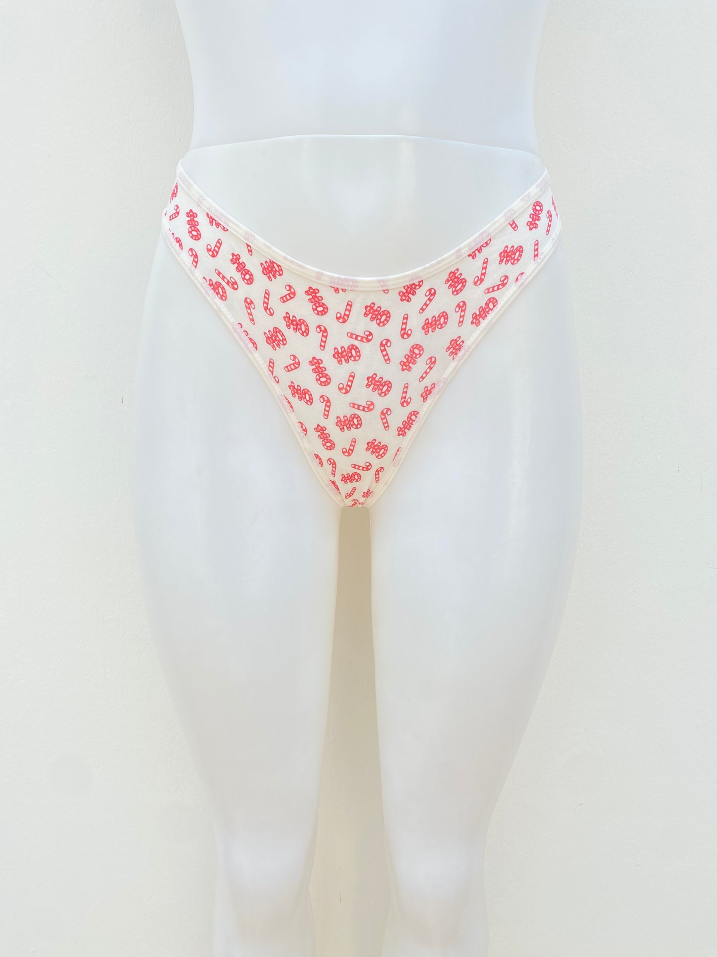 Panti Forever 21 original, blanco hueso con diseño de bastones dulces en rojo.