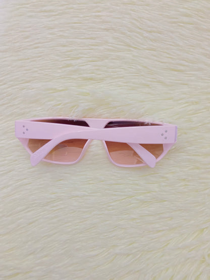 Lentes, rosado claros con micas en color marron y detalles en plateado, 100 % Polycarbonate y protección UV.