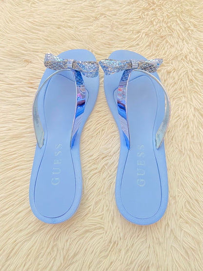 Sandalias GUESS original azul claro con moños en  brillos.
