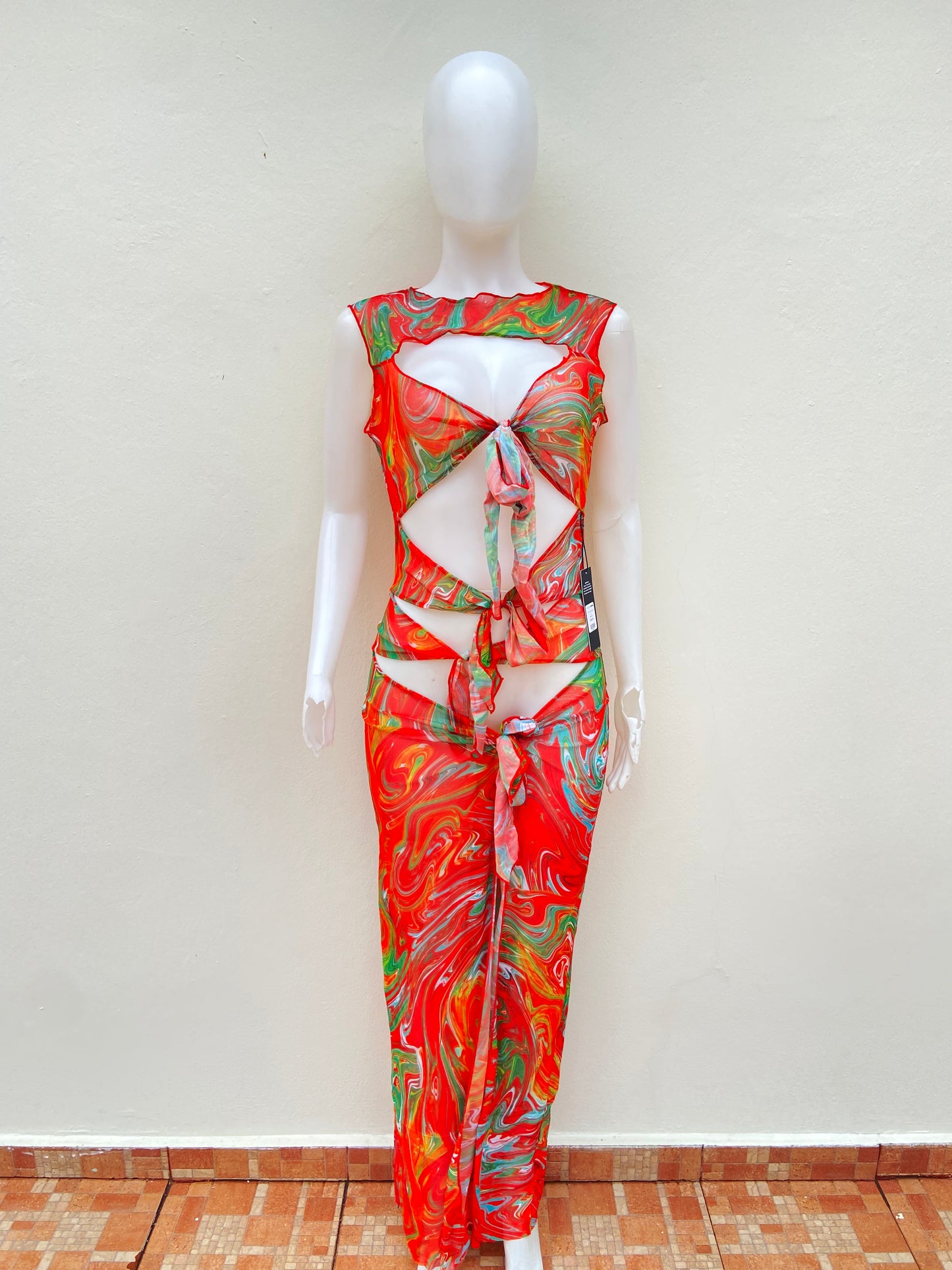 Vestido/ Cover Up, naranja con estampado en color verde y amarillo.