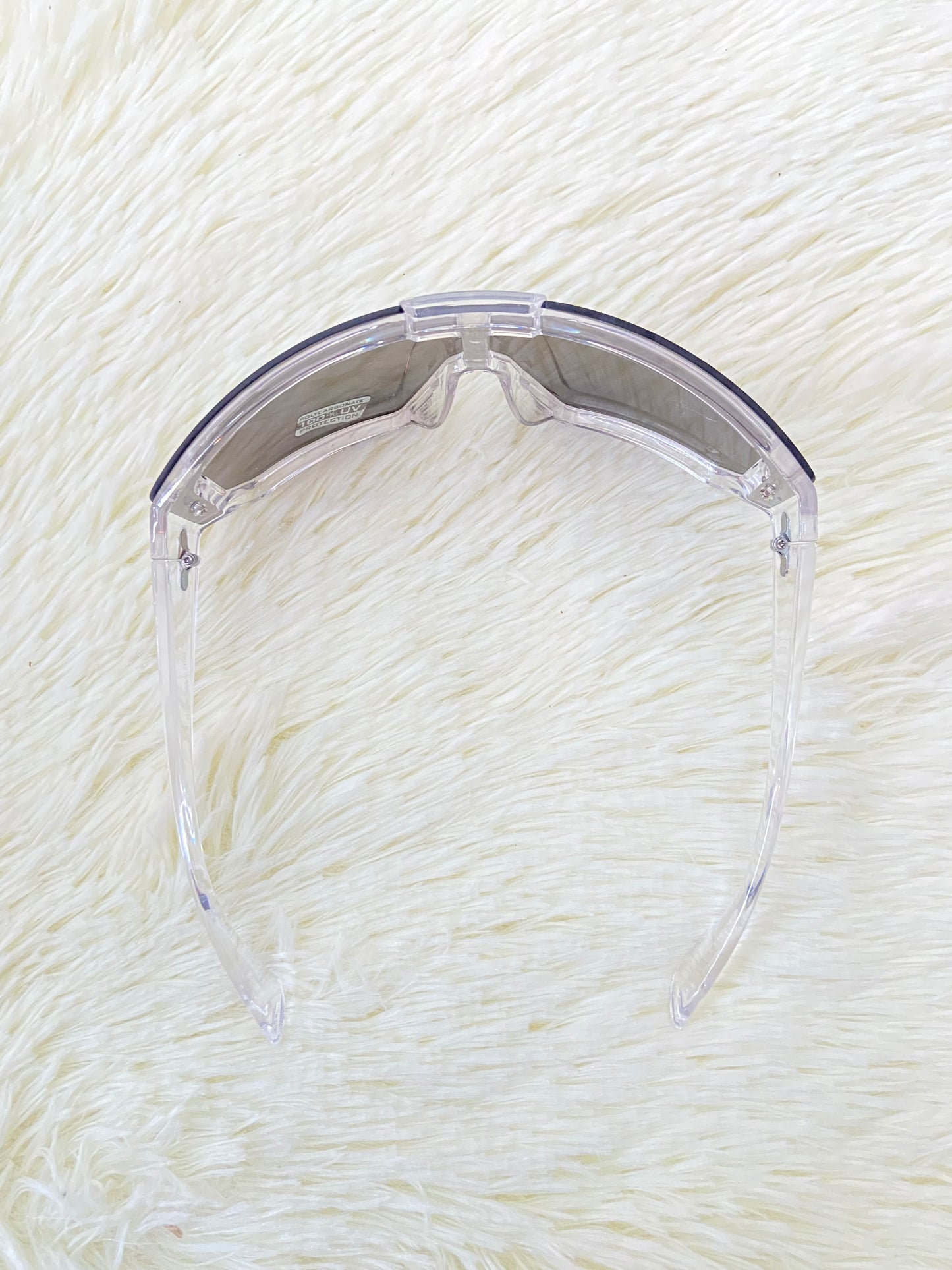 Lentes, plateados grandes con montura transparente, 100 % Polycarbonate y protección UV.