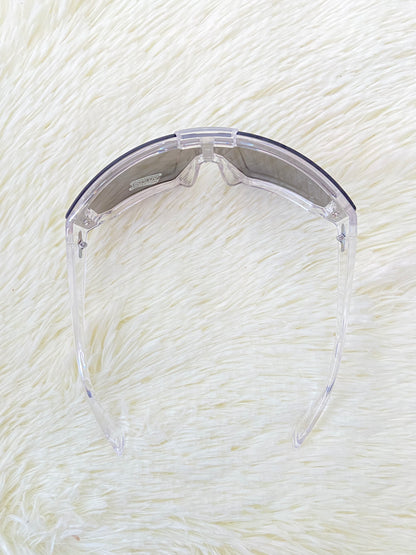 Lentes, plateados grandes con montura transparente, 100 % Polycarbonate y protección UV.
