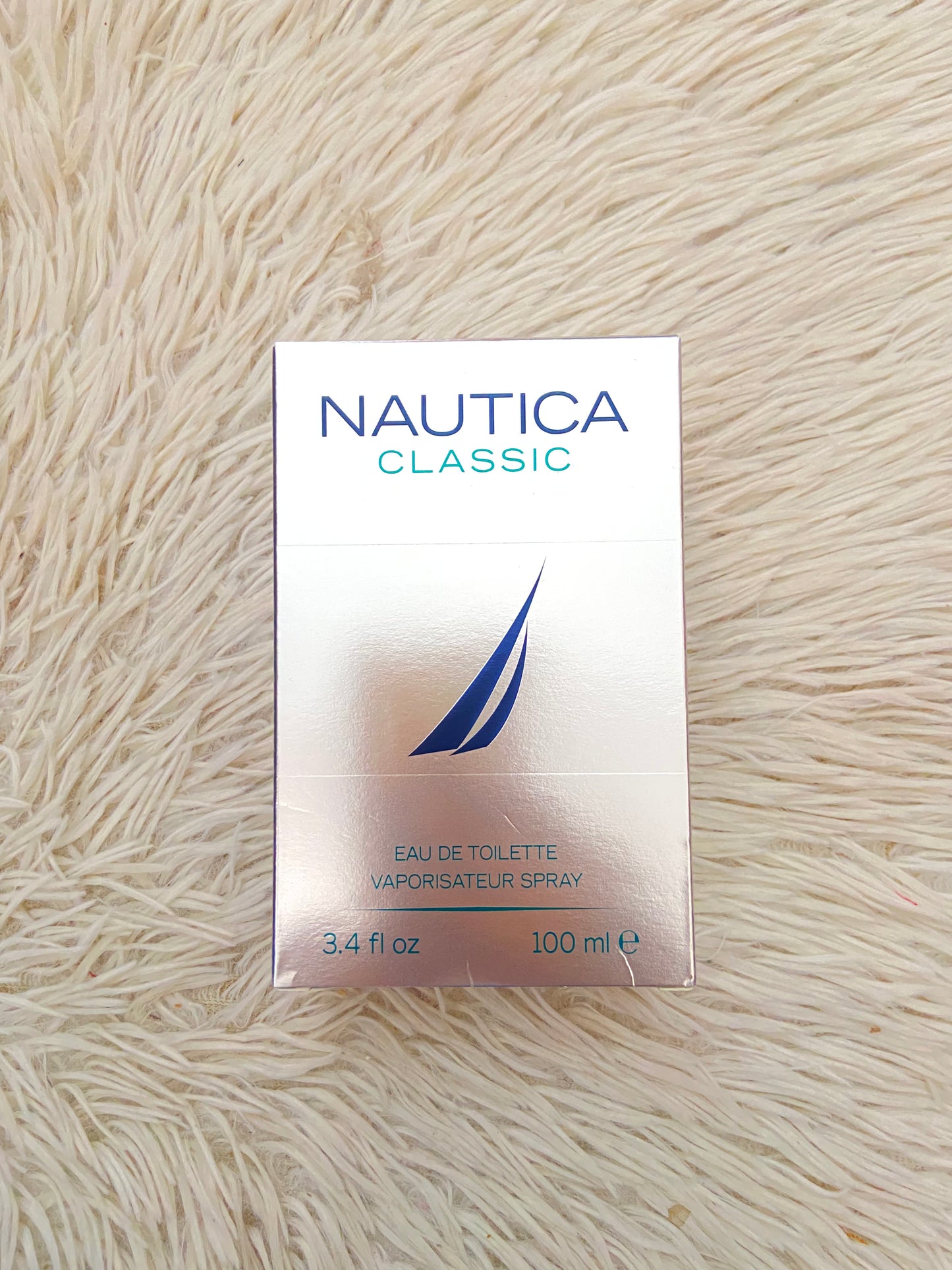 Perfume NAUTICA CLASSIC original, azul turquesa con plateada.