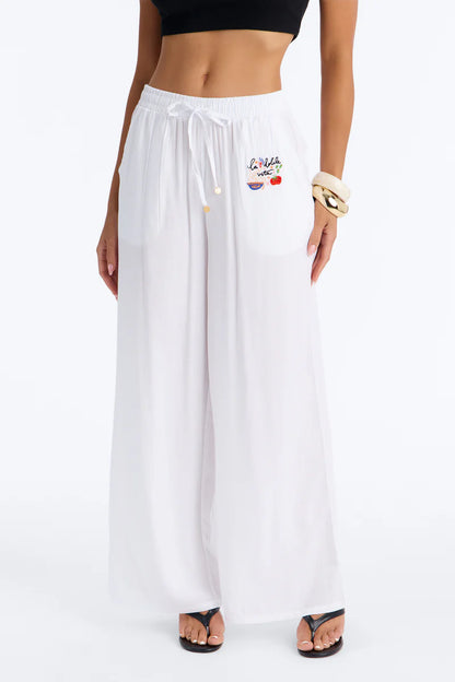 Pantalon/ Cover Up MYKONOS BLU SWIMWEAR original, blanco con letras LA DOLCE VITA ( la dulce vida ).