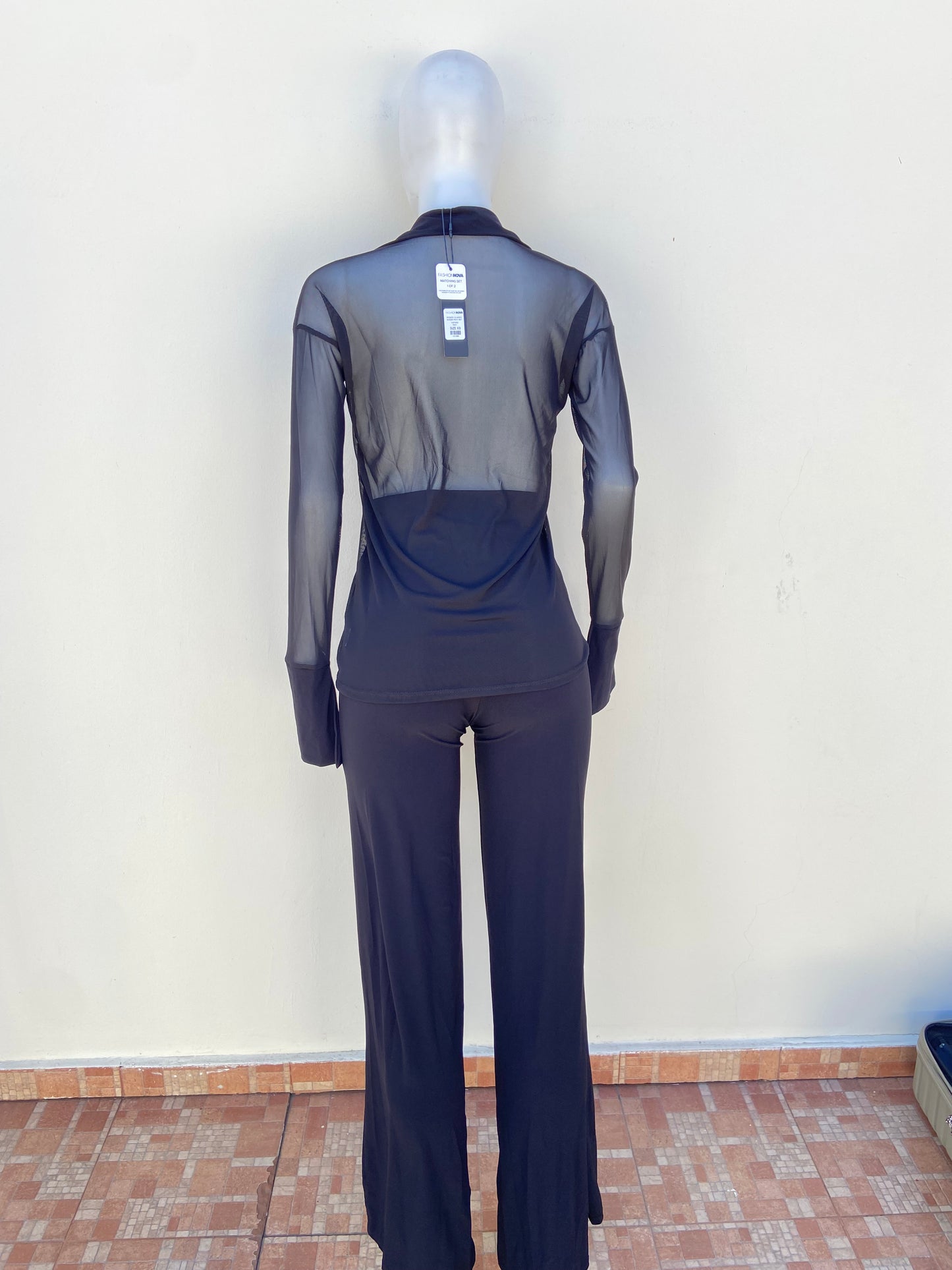 Conjunto, negr de camisa y pantalon transparente, manga larga.