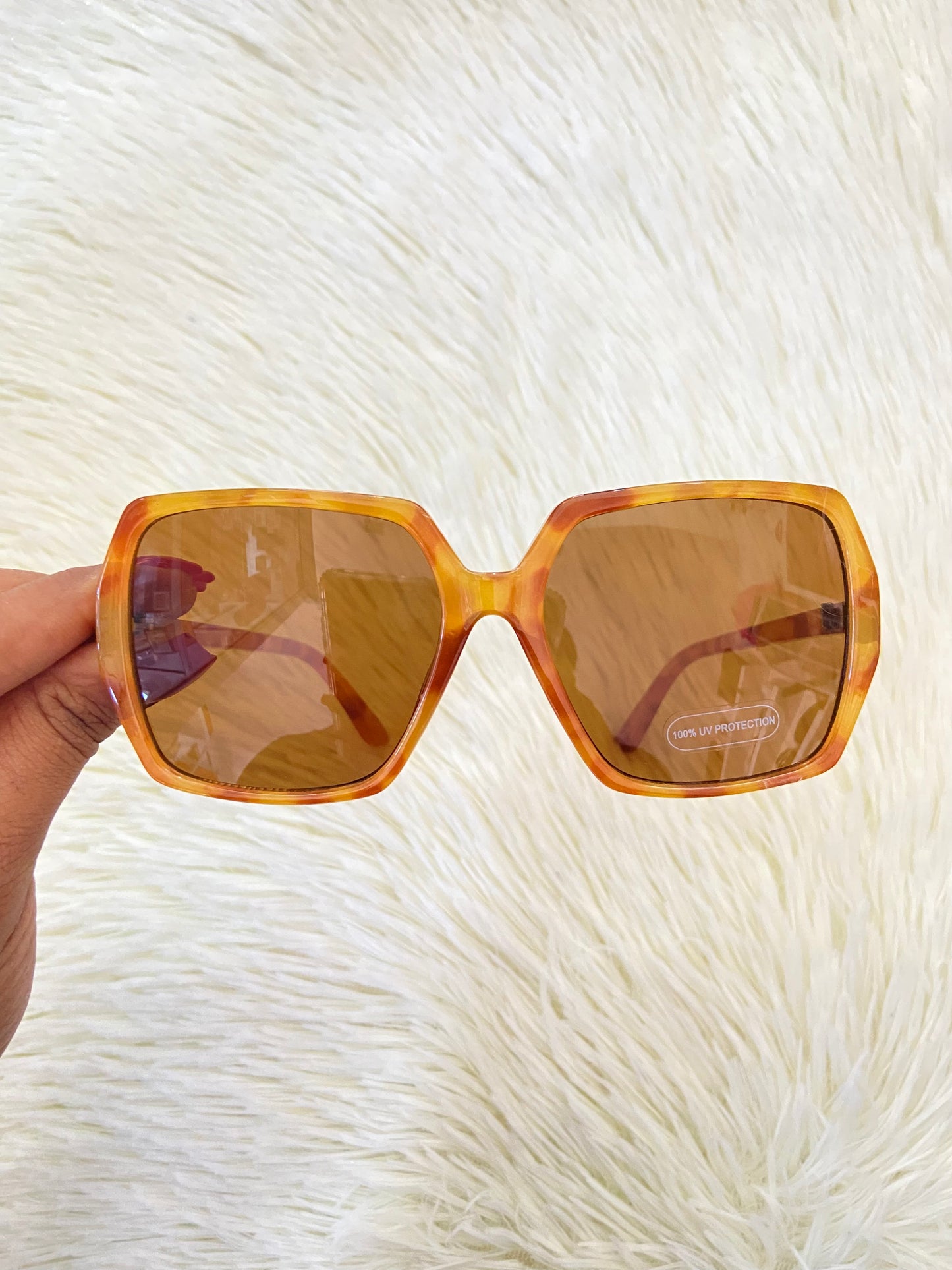 Lentes, marron claro con estampado de animal print y micas claras, con protección UV 100-400.