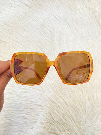 Lentes, marron claro con estampado de animal print y micas claras, con protección UV 100-400.