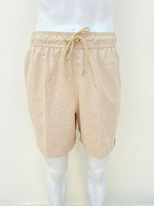 Bañador GEORGE original color crema ( beige) liso, con lazos ajustables.