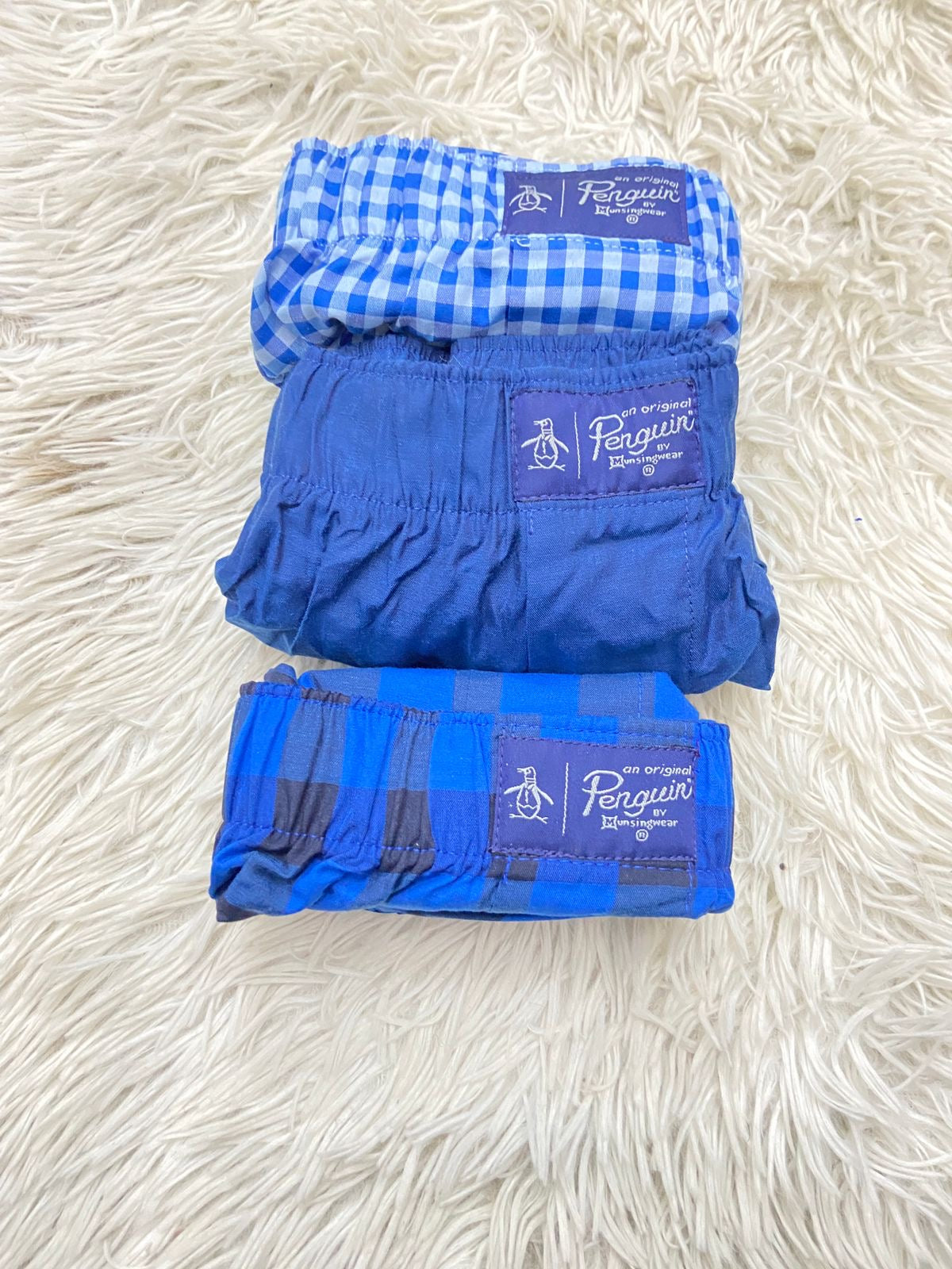 Boxers Penguin original, de 3 pacquete con diferentes tonos de azul.