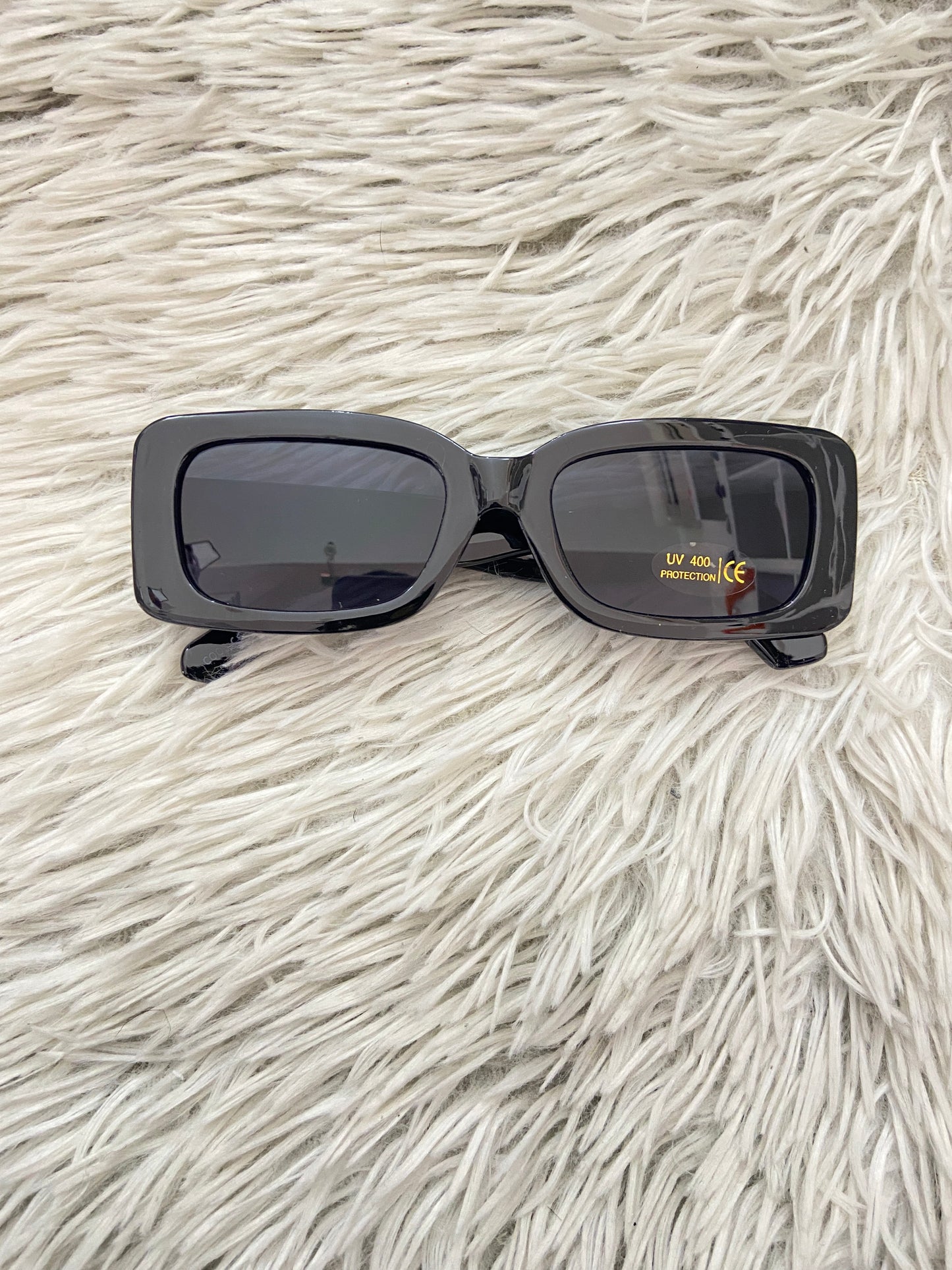 Lentes Fashion Nova original negro con micas claras, cuadrados.