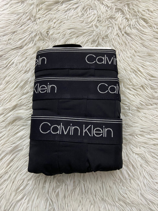 Boxers Calvin Klein pack-3 original negro con letras de la marca en blanco.