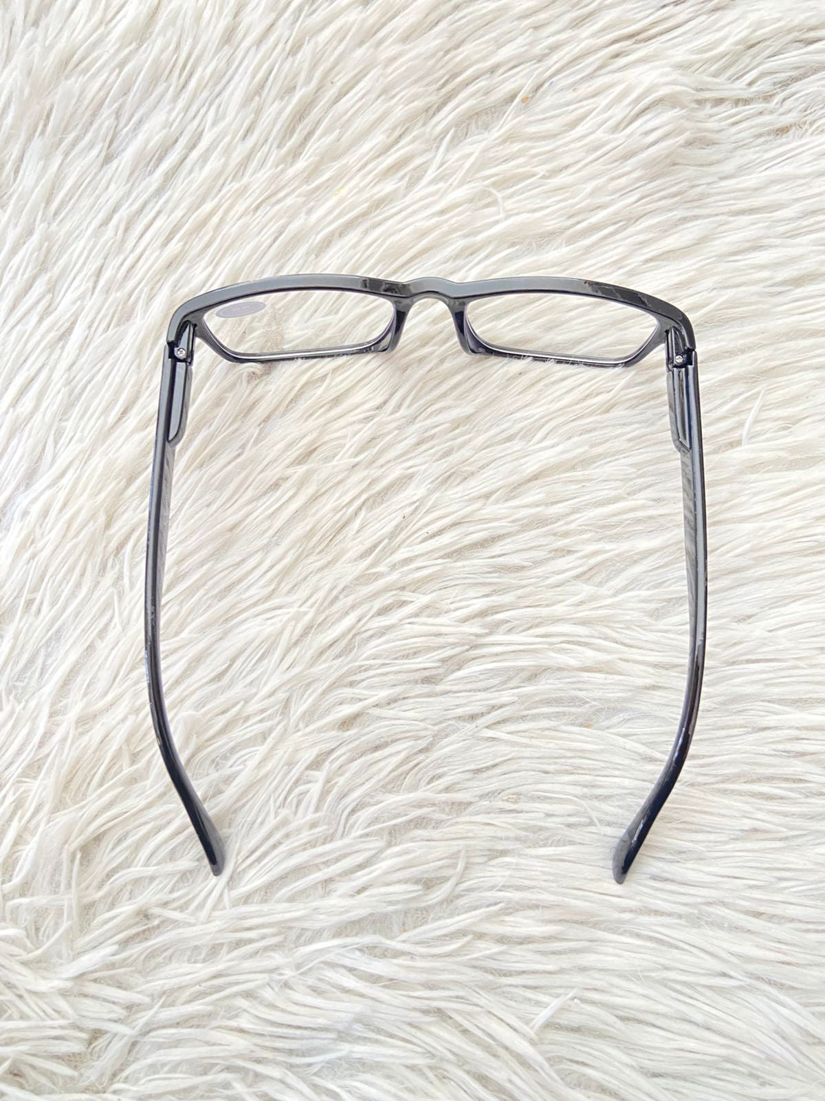 Lentes en color negro con micas claras, pequeño