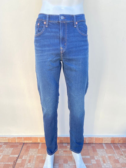 Pantalon jean AMERICAN EAGLE Original, en color azul oscuro liso Airflex ATHLETIC FIT.