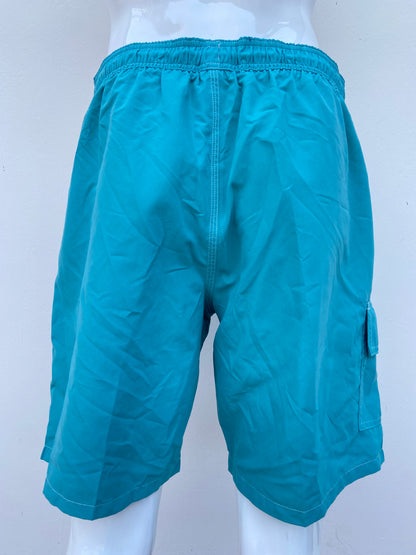Baggy/bañador, azul turquesa liso con lazos ajustables blancos Protección UPF 50+: Brinda protección contra los rayos UV.