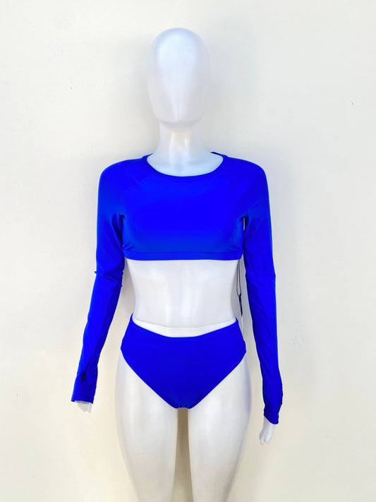 Biquini, azul rey liso, mangas largas, dos piezas.