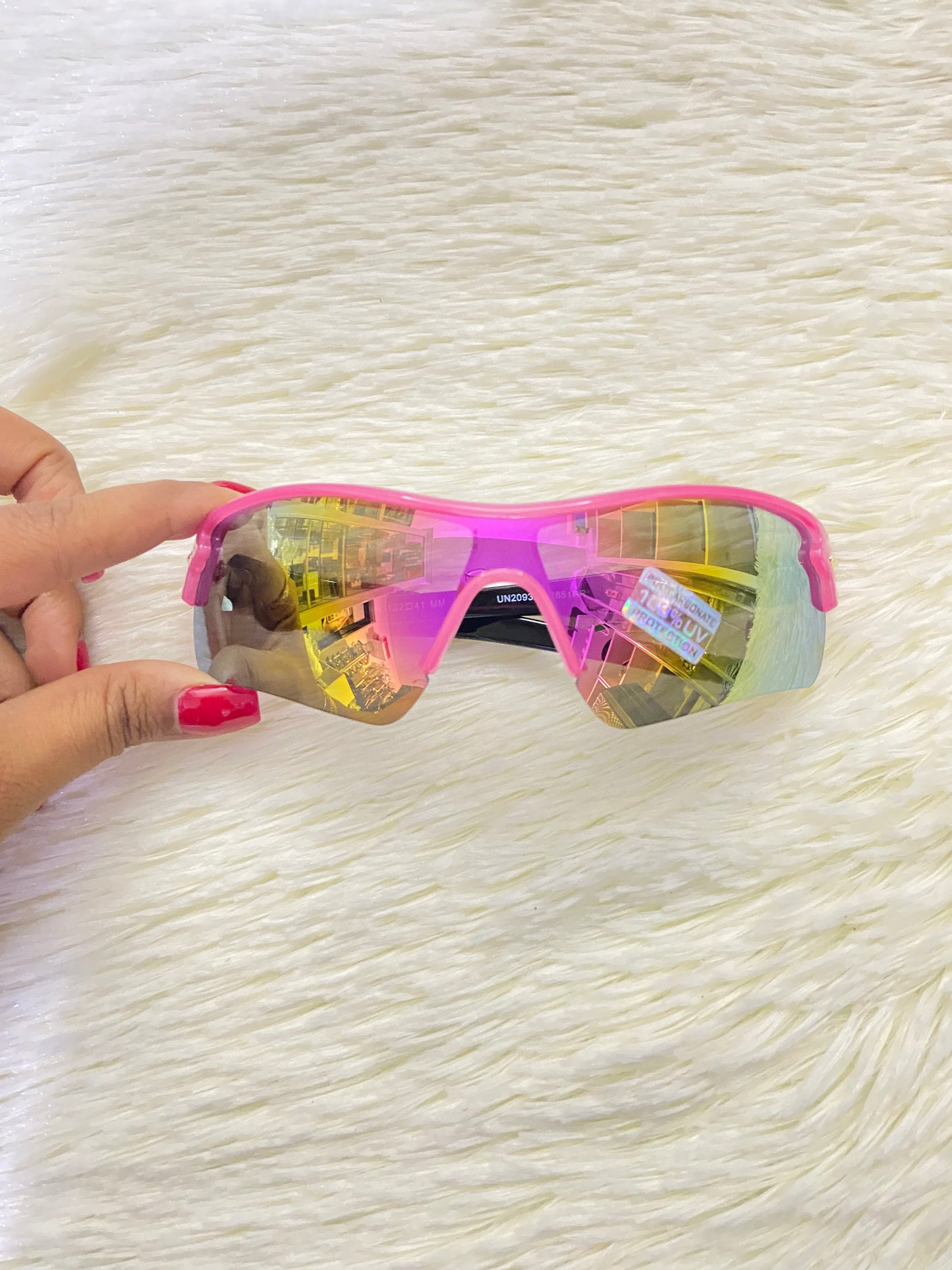 Lentes, rosados con negros y micas que cambian de color, con 100 % Polycarbonate y protección UV.
