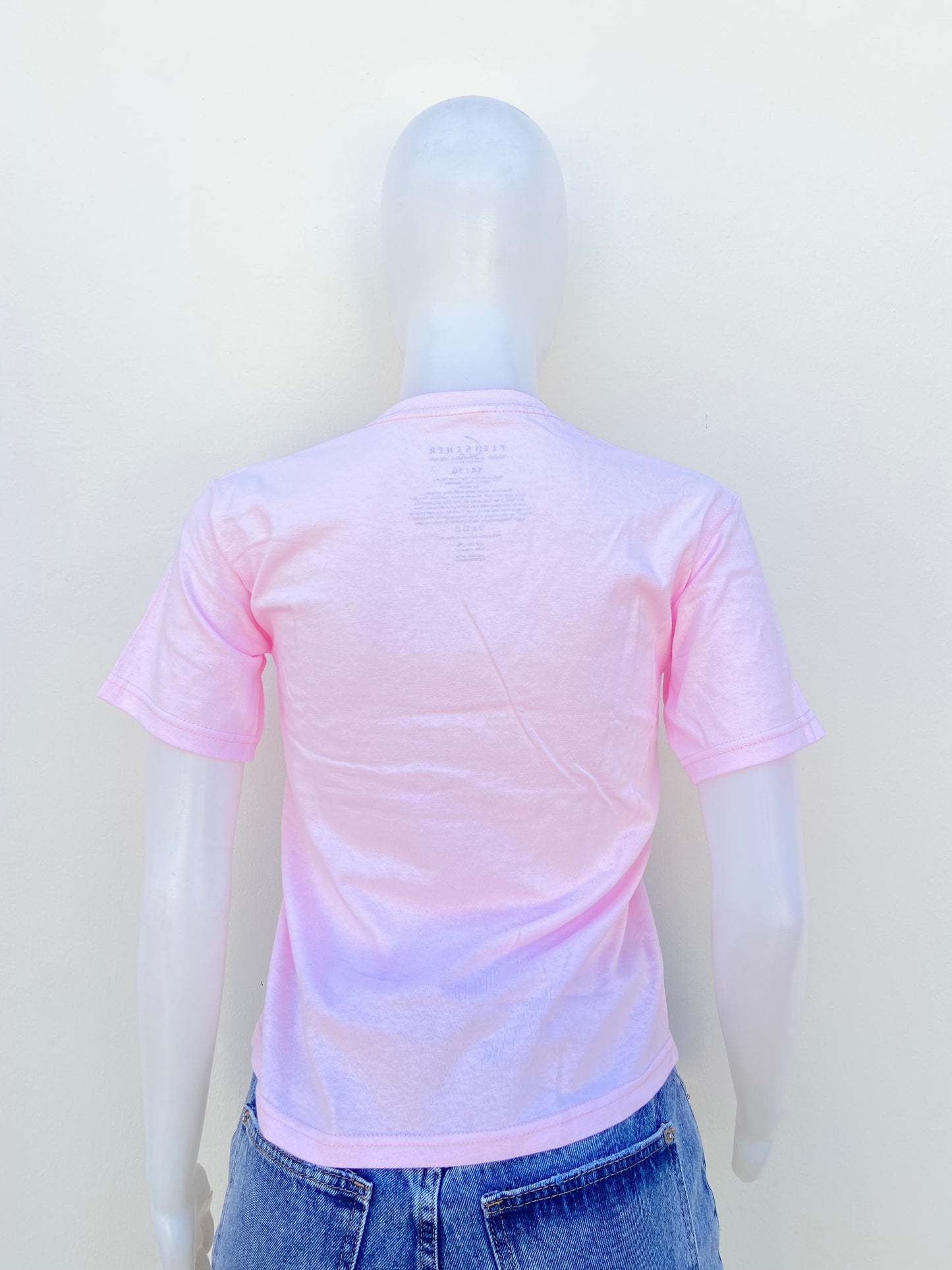 T-shirt FLEISCHER STUDIOS original rosado claro con estampado de una muñeca y letras ÁNGEL.